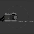 Vintage Electronic Camera With Printed Photos On Black Reflective Surface