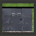 Traditional Two Story Guesthouse Building With Blue Tiled Roof Red Wooden Accents And Green Lawn