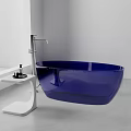 Blue Freestanding Bathtub With Modern Faucet And White Side Table In Minimalist Bathroom Interior