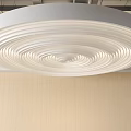 Elegant Modern Ceiling Design With Circular Spiral Texture And Integrated LED Lighting