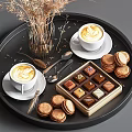 Coffee Cookies And Desserts On Black Tray With Dried Flowers