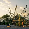 Modern Garden Art Installations With Metal Glass Frames Cacti Trees Gravel Ground And People