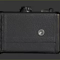 Retro Vintage Black Camera with Leather Texture Lens and Control Buttons