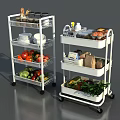 Fresh Vegetables On Multi Tiered Rolling Kitchen Storage Carts With Plates And Utensils