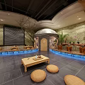 SPA Sauna Interior With Stone Walls Wooden Table Cushions And Green Plants