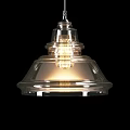Elegant Classic Pendant Light With Transparent Glass Shade And Glowing Vintage Bulb