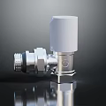 Silver Metal Valve With White Top And Threaded Connection For Plumbing Use
