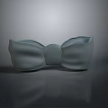 Gray Butterfly Shaped Decoration On Dark Reflective Surface With Smooth Finish