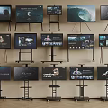 Multiple Flat Screen TVs Arranged On Various Stands With Different Displayed 3d model