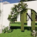 Outdoor Wedding Arch Decoration With White Green Flowers And Lawn Setting