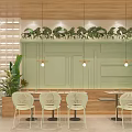 Brunch Cafe Outdoor Seating Area With Umbrellas Tables Chairs And Green Plants