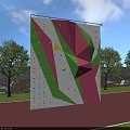 Outdoor Sports Equipment Climbing Wall with Colorful Pink Green Geometric Shapes Near Trees and Running Track