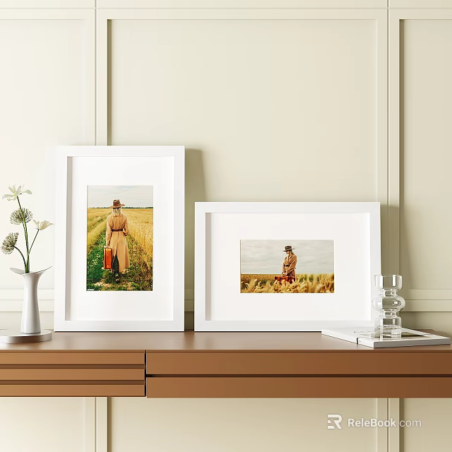 White Photo Frames With Wheat Field Artwork On Wooden Cabinet Including Vase And Glass 3d model 