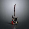 Household Electric Guitar With Black Body And Decorative Stickers On Gray Background