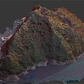 Mountainous Island Terrain With Lush Green Vegetation Rocky Coastline And Blue Seawater