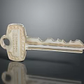 Metallic Key With Engraved Chateau Thierry Text And Shiny Detailed Surface