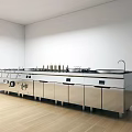 Modern Commercial Kitchen With Stainless Steel Cooking Equipment And Workstations