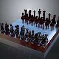 Elegant Chess Set with Black and Silver Pieces Arranged on Glossy Chessboard