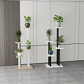 Potted Plants On Multi Tiered Light And Black White Stands In Modern Interior