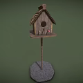 Wooden Birdhouse With Sloped Roof And Stone Base For Garden Birds