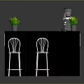 Modern Black Kitchen Island With Plants Coffee Machine Dessert Display Case And Bar Stools