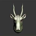Green Fantasy Creature Head Sculpture With Red Spiral Horns And Purple Red Stripes