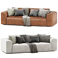 Stylish Brown and Gray Two-Seater Sofa with Patterned Pillows and Throw Blanket