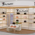 PLOVER Bag Store Interior With Shelves Displaying Various Handbags And Decorative Plants