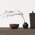 Black Ceramic Vase With Orange Blossom Branch And Wooden Bowl Decor On Table White Background