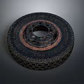 Vintage Industrial Style Tire Shaped Coffee Table With Textured Design And Rusted Rim