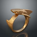 Elegant Golden Fish Shaped Ring With Textured Surface And Unique Fashion Design