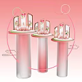 Modern Transparent Column Display Shelves With Circular Decorations And Floral Items On Pink Background