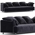 Black Velvet Sectional Sofa with Plush Cushions and Modern Design