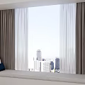 Gray Thick Curtains With White Sheer Panels By Window Seat With City View