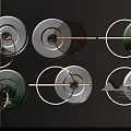 Creative Wall Decorations Circular Plates With White Green Black Tones Golden Rods And Brass Balls