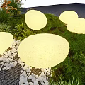Round Yellow Outdoor Lights Illuminating Lawn Area with Green Plants and Stone Path