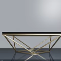 Modern Coffee Table With Black Tabletop And Golden Geometric Base Design