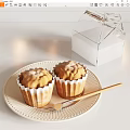 Delicious Freshly Baked Cupcakes on White Plate with Wooden Fork and Transparent Box
