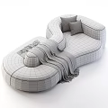 Bouclé Fabric Beige Curved Sectional Sofa With Brown Throw Blanket And Decorative Pillows