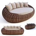 Modern Outdoor Sofa Round Woven Rattan Design with Light Colored Seat Cushions