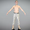 A Shirtless Man With Chest Tattoos In Camouflage Pants And Military Boots Standing With Arms Outstretched