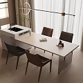 Modern Open Kitchen Space With Sleek Island Countertop And Dining Chairs