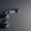 Commercial Equipment Silver Small Bottles with Metal Lids Smooth Surface Reflective Finish on Gray Surface