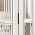 Dark Colored Swing Doors With Arched Top Glass Panes And Metal Handles