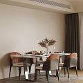 Modern Dining Table And Chairs With Orange Backrest Beige Seats Wine Glasses Tableware Decorative Plant In Room