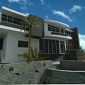 Modern Detached Villa Exterior With Large Glass Windows And Palm Trees