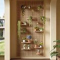 Indoor Potted Plants Display On Perforated Wall With Shelves And Hanging Greenery
