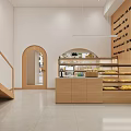 Cozy Dessert Shop Interior Featuring Wooden Counter Display Shelves Arched Doorway And Wall Signage