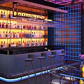 Modern KTV Lounge Interior With Neon Lights Bar Counter And Stage Screen