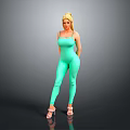 Blonde Woman in Green Jumpsuit Standing with High Heels on Gray Background